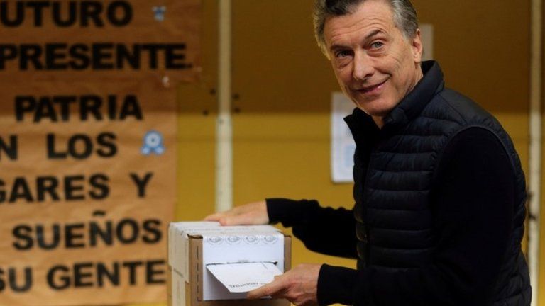 Argentine President Mauricio Macri casts his vote at a polling station in mid-term primary elections in Buenos Aires, Argentina August 13, 2017