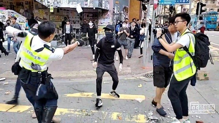 Moment before the protester is shot