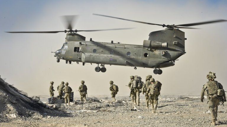 Soldiers approach Chinook