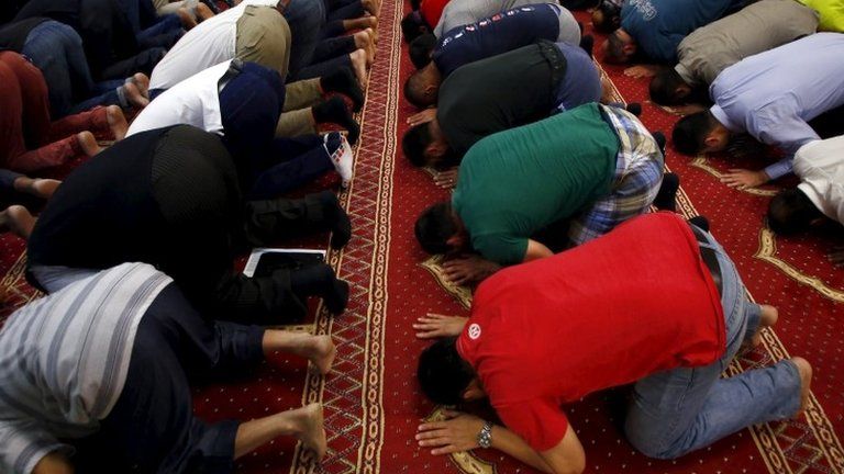 Worshippers take part in a prayer session at the Parramatta mosque in western Sydney, Oct 2015