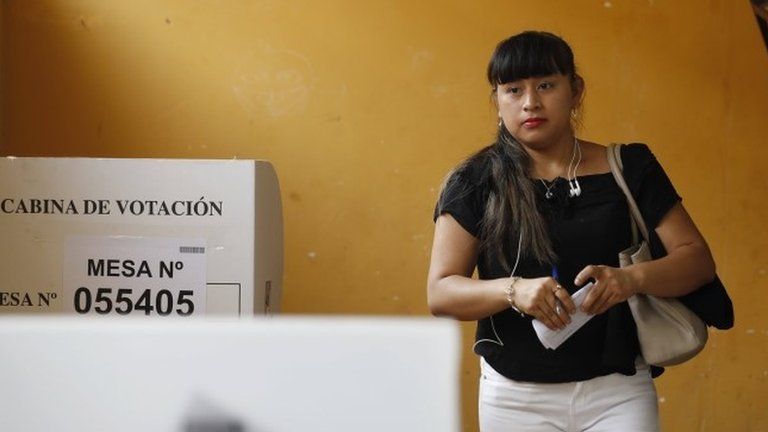A woman at a polling station in Lima