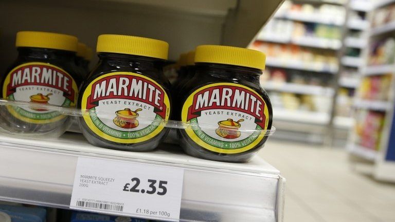 Jars of Marmite on a supermarket shelf
