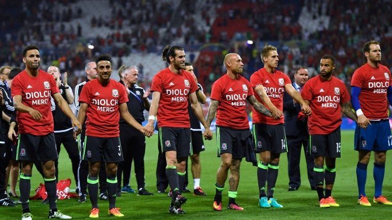 Wales players after defeat by Portugal