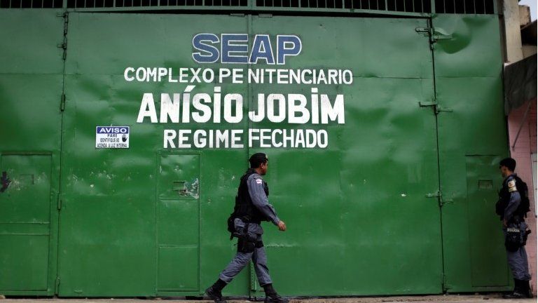 Riot police walks past the main entrance of Anisio Jobim prison in Manaus, Brazil, January 3, 2017.