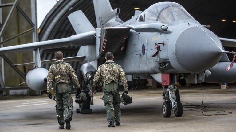 An aircrew with their Tornado GR4 at RAF Marham