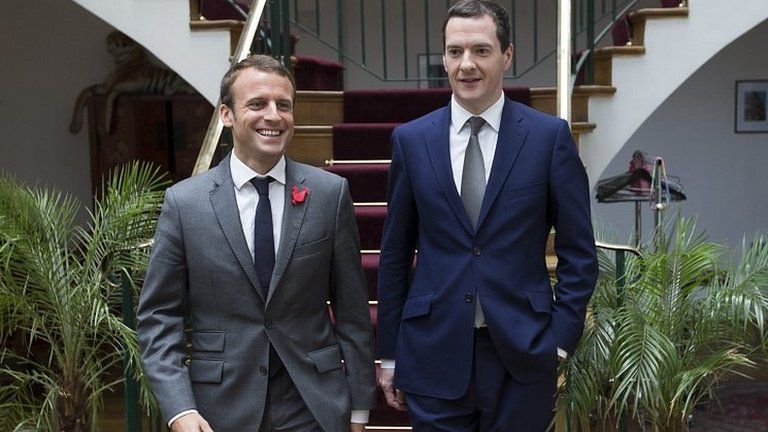 French Economy and Industry Minister Emmanuel Macron (L) and British counterpart, British Chancellor of the Exchequer George Osborne