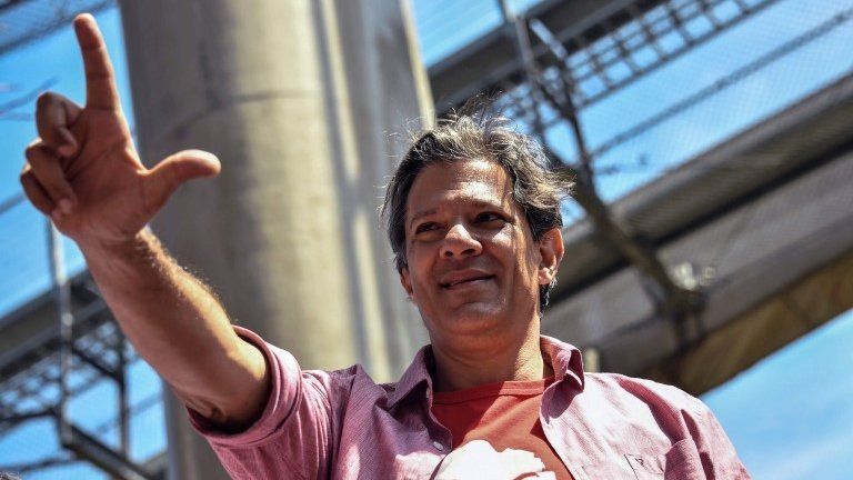 Presidential candidate for the Workers' Party (PT), Fernando Haddad, gestures as he campaigns in Sao Miguel Paulista