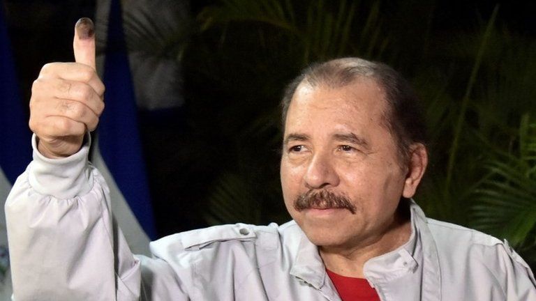 Nicaraguan President Daniel Ortega gives the thumb up after voting in Managua during the presidential election on November 6, 2016.