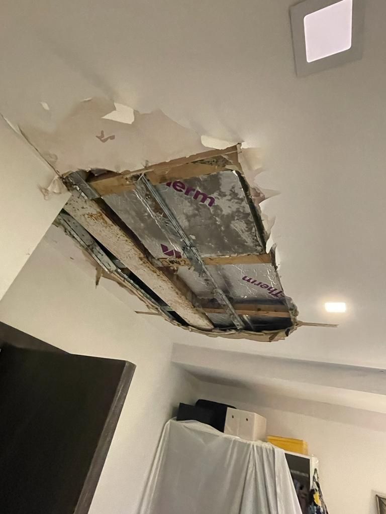 Image of a collapsed ceiling at Agar Grove