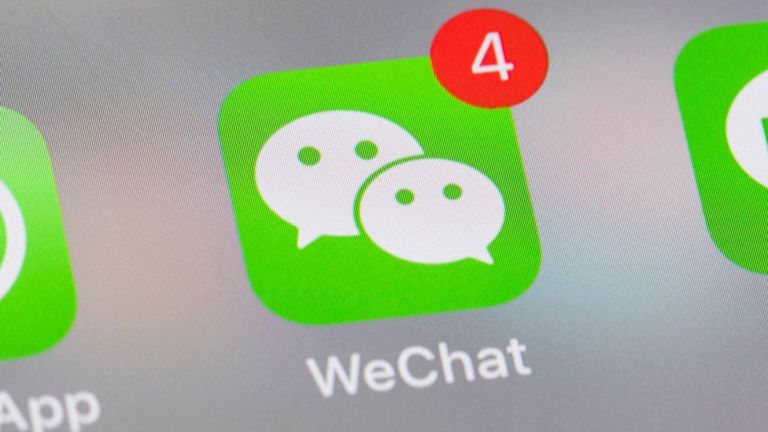 smart phone with the icons for the social networking apps WeChat and others