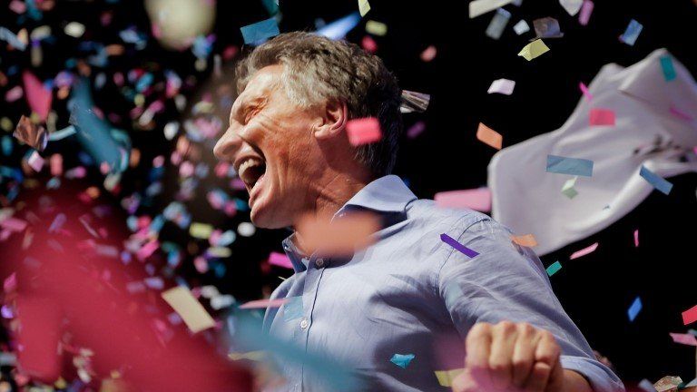 Photo released by Cambiemos press office of Mauricio Macri celebrating at the Cambiemos party headquarters in Buenos Aires on November 22, 2015,