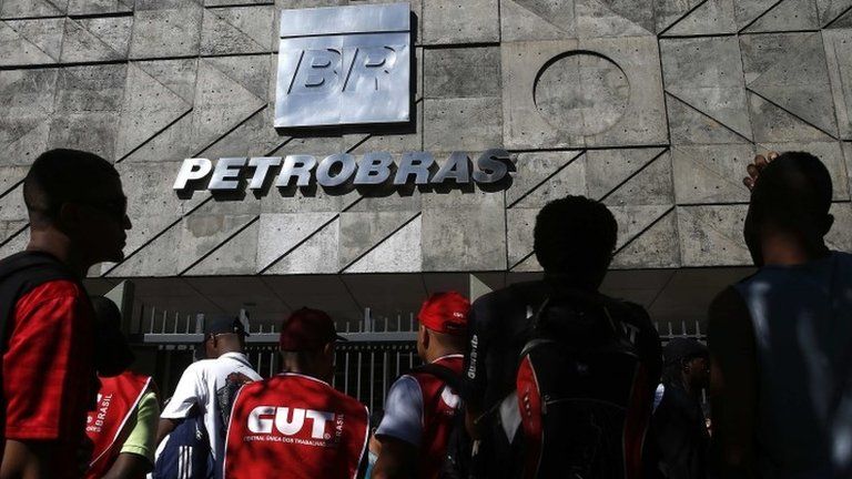 Workers outside the Petrobras headquarters in Rio