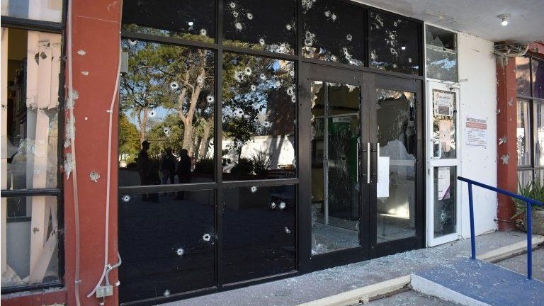 A view of the bullet-riddled facade of the town hall of Villa Union after clashes sparked by suspected cartel gunmen in a northern Mexican town killed 20 people this weekend in Villa Union, in Coahuila state, Mexico December 1, 2019