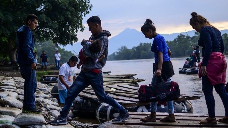 Central American migrants arrive in Ciudad Hidalgo in Chiapas State, Mexico, after illegally crossing the Suchiate river from Tecun Uman in Guatemala in a makeshift raft, on June 10, 2019