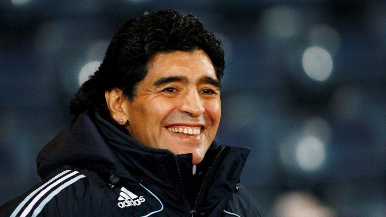 Diego Maradona smiles during their international friendly soccer match against Scotland at Hampden Park stadium in Glasgow, Scotland November 19, 2008.