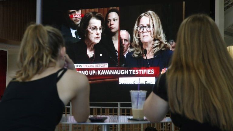 Female students watch the hearing