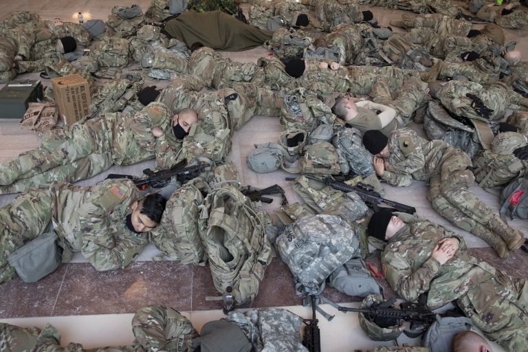 Hundreds of National Guard sleep on the floor