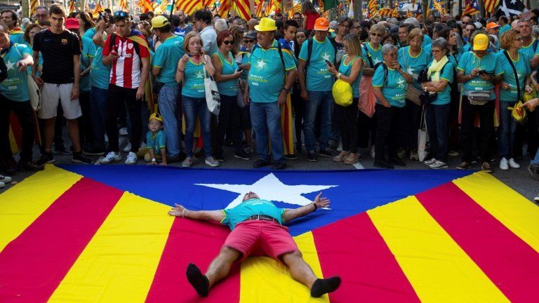Catalans turn out on the streets of Barcelona in support of independence on their national day, known as the Diada