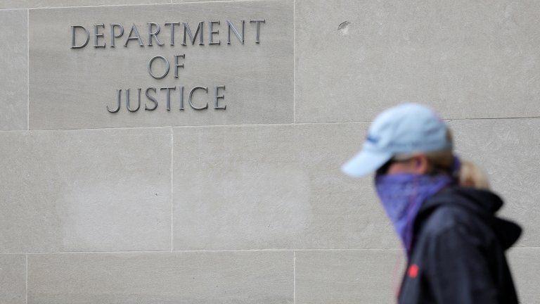 The sign for the Department of Justice in Washington DC