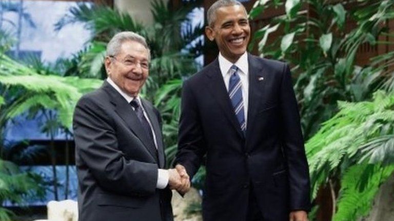 US President Barack Obama (R) and Cuban President Raul Castro greet one another before bilateral meetings at the Palace of the Revolution March 21, 2016 in Havana, Cub