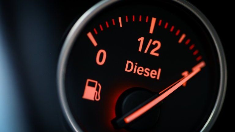 Diesel fuel gauge in a car, showing a full tank