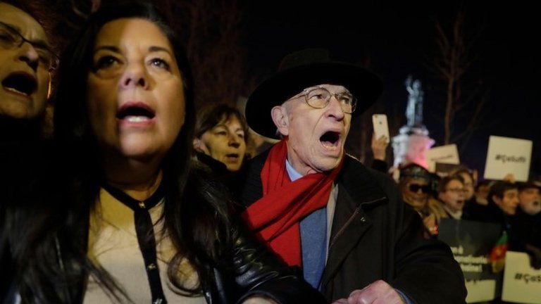 People at a protest against anti-Semitism in France