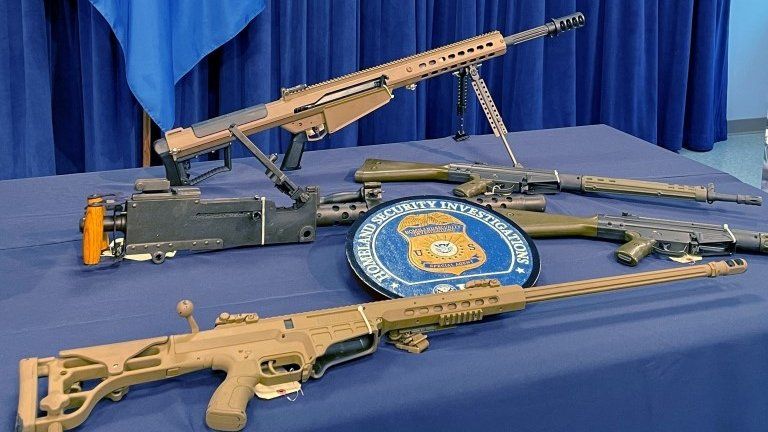 Weapons seized by U.S. authorities that had been destined for illegal export to Haiti are displayed during a news conference in Miami, Florida, U.S. August 17, 2022
