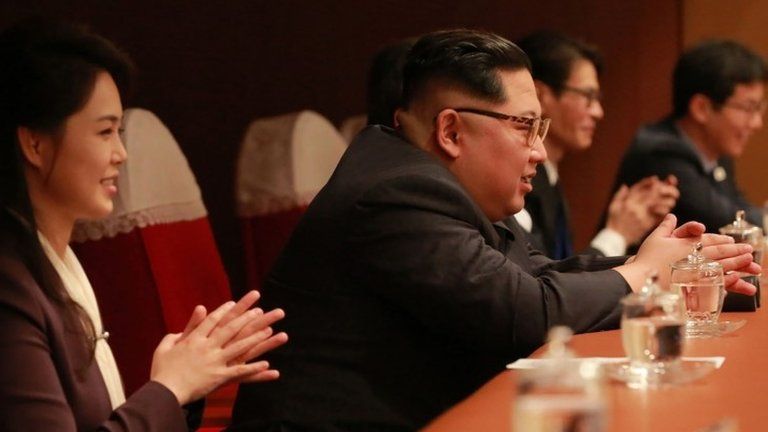 April 1, 2018 picture released by North Korea's official Korean Central News Agency shows North Korean leader Kim Jong-Un and his wife Ri Sol-Ju watching performances during a rare concert by South Korean musicians at the East Pyongyang Grand Theatre
