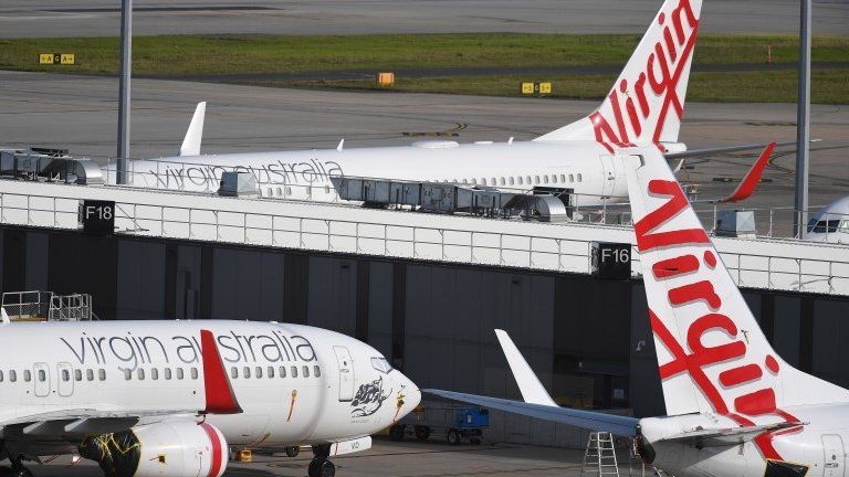 A view of grounded Virgin Australia planes at Tullamarine Airport in Melbourne