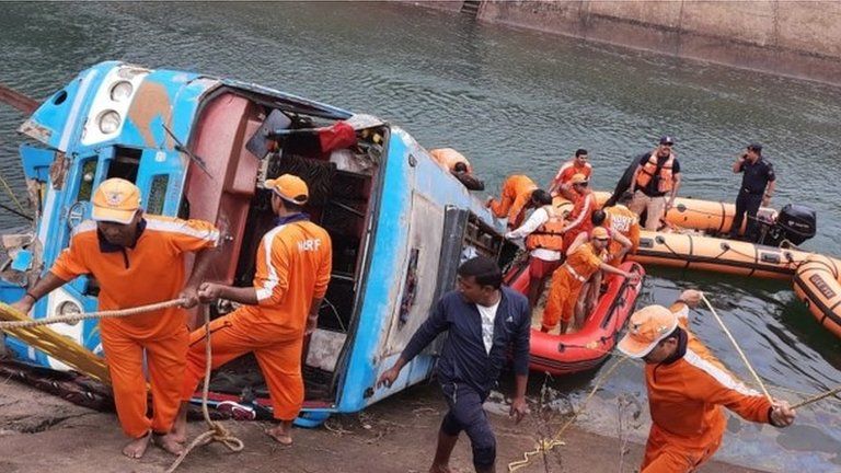 National Disaster Response Force (NDRF) personnel conduct a rescue operation at the site after a bus in fell into a canal in Sidhi Madhya Pradesh, India, 16 February 2021.