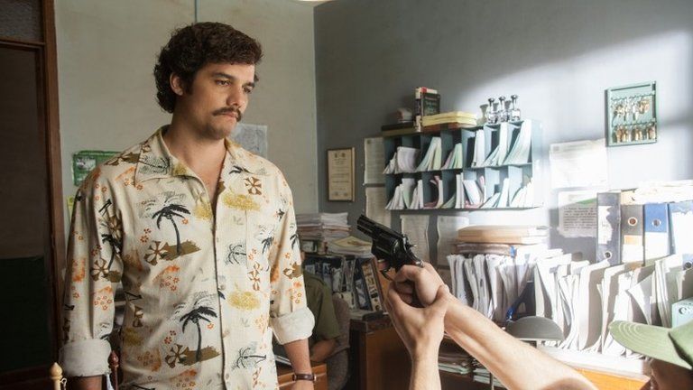This image released by Netflix shows Wagner Moura as Pablo Escobar in the Netflix Original Series "Narcos." In a partnership with Univision, the Netflix series will air on the network.