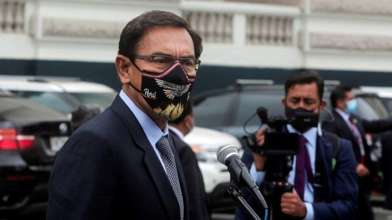 Martin Vizcarra addresses the media outside Congress as he faces a second impeachment trial over corruption allegations, in Lima, Peru November 9, 2020