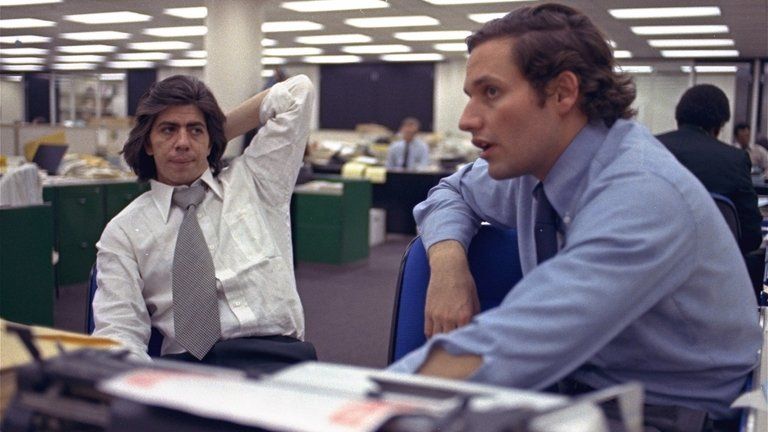 Bob Woodward, right, and Carl Bernstein, whose in the Washington Post newsroom 7 May 1973