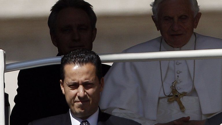 The Pope's butler, Paolo Gabriele (bottom left) arrives with Pope Benedict at the Vatican (23 May 2012).