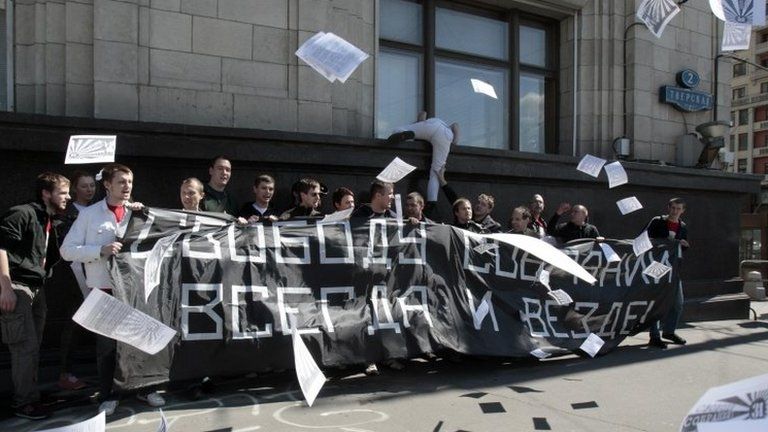Activists of the National Bolshevik Party take part in a rally to against the new bill