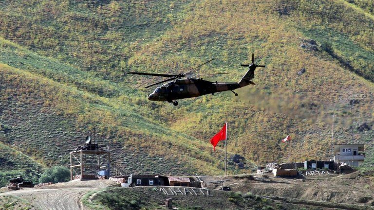 Helicopter flies above Turkish army outpost in Hakkari province on 19 June 2012