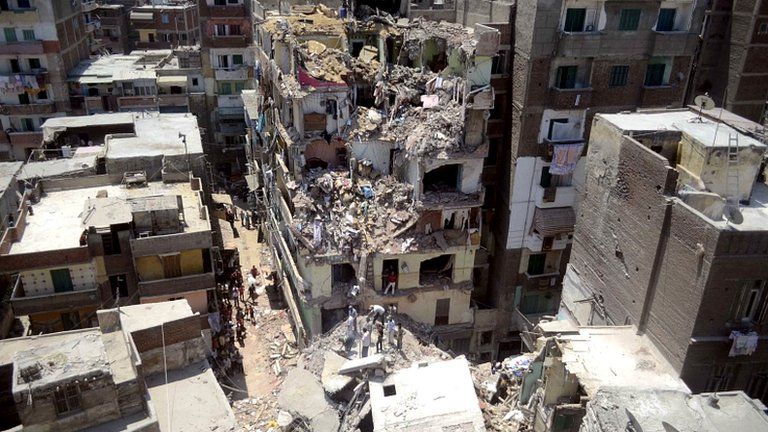 Scene of the collapse of a block of flats in Alexandria, Egypt (pictured on 15 July)