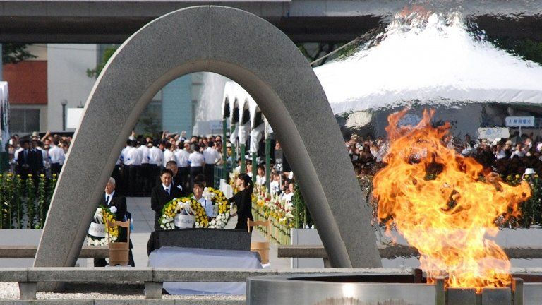 Relatives of victims lay wreaths at an altar for the atomic bomb victims in Hiroshima on 6 August 2012
