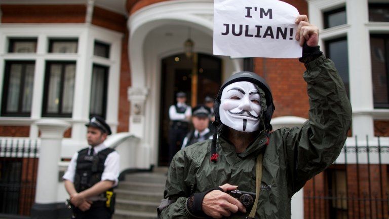 A supporter of Julian Assange, outside the Ecuadorean Embassy in London