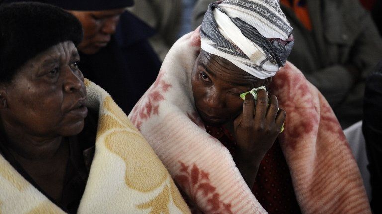 Women at a memorial service for those killed during the recent strike in Marikana