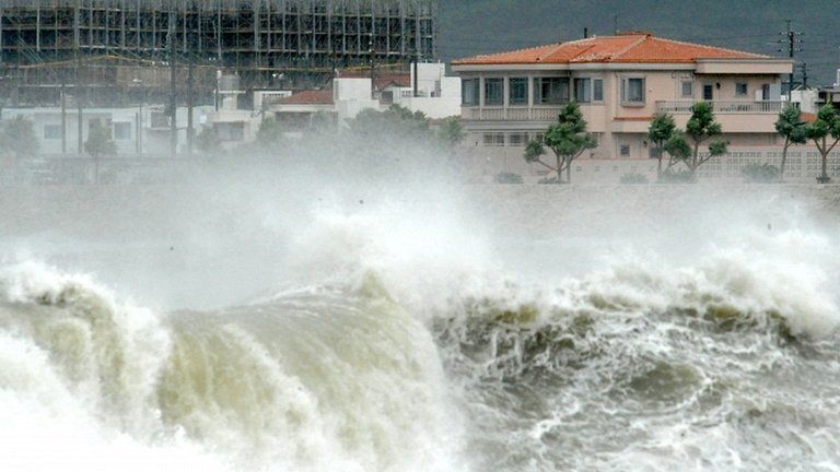 High waves pound shore in Yonabarucho, Okinawa prefecture 26/08