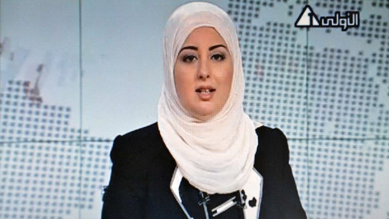 Fatima Nabil reads the news on Egypt's state TV. Photo: 2 September 2012