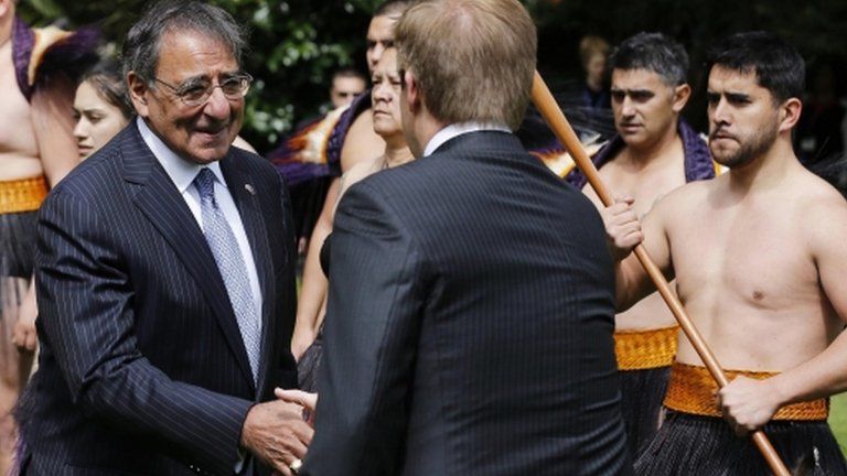 US Secretary of Defence Leon Panetta (L) shakes hands with New Zealand's Minister of Defence Jonathan Coleman after a Maori welcoming ceremony at Government House in Auckland on 21 September, 2012