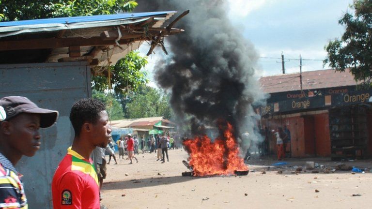 A fire burning in Conakry's main market during clashes on Friday 21 September 2012