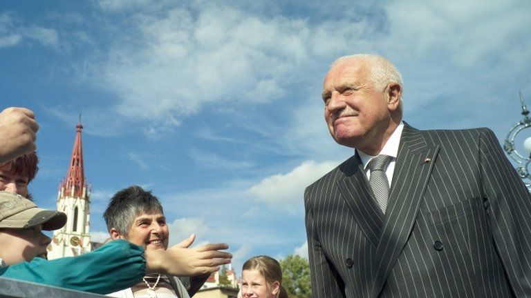Czech President Vaclav Klaus greets people during the opening ceremony of a new bridge in the village of Chrastava