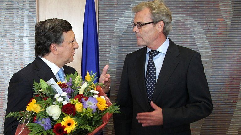 EU Commission President Jose Manuel Barroso (left) is congratulated by Norwegian ambassador to EU, 12 Oct 12