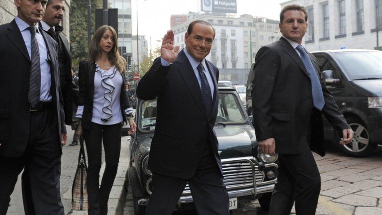 Berlusconi arriving in court on 19 October 2012.