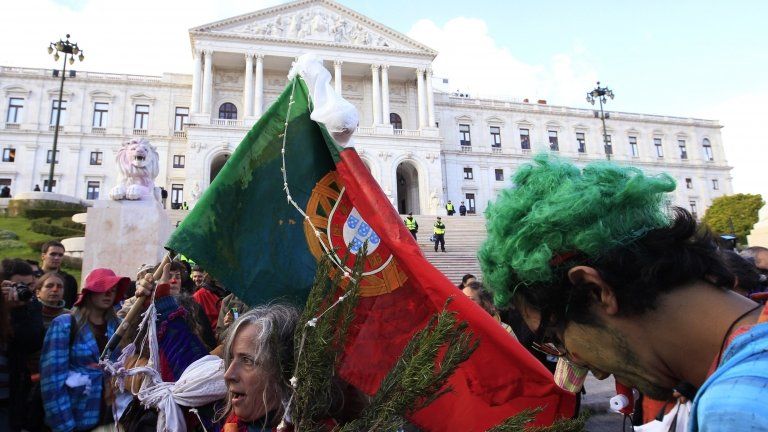 Anti-austerity protesters outside the Portuguese parliament in Lisbon