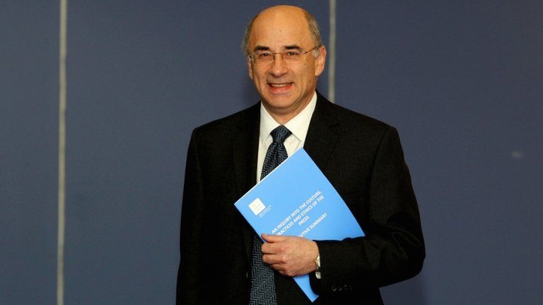 Lord Justice Leveson with his report