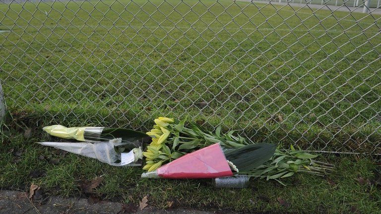 Bouquets of flowers at the Buitenboys football club in tribute to linesman Richard Nieuwenhuizen